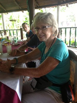 Joan being surprised with a cake on her birthday